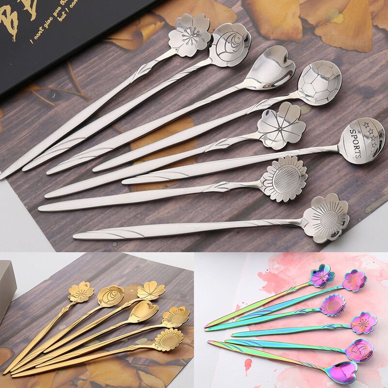 Bola de baloncesto de cuatro hojas de flor de cerezo japonesa chapada en oro con petalos de rosa para remover una cucharada de cafe de acero barato