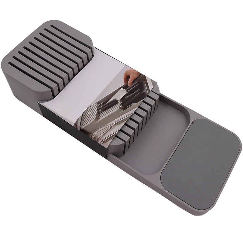 El bloque de cuchillos en el cajon sostiene la bandeja organizadora del cajon de la cocina para cuchillos