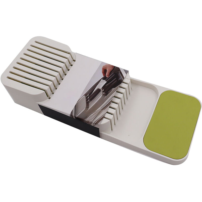 El bloque de cuchillos en el cajon sostiene la bandeja organizadora del cajon de la cocina para cuchillos